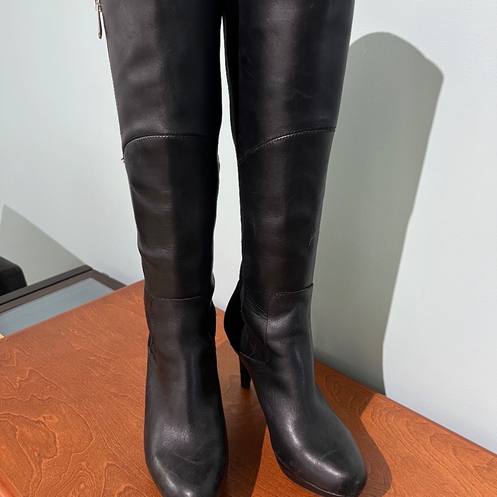 Black leather spike heeled boots